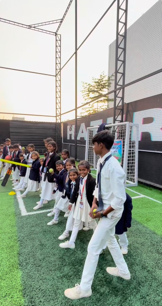 Organized queue of students on the turf playground
